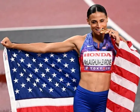 The American sprinter runs quickest female 400m in 40 years to secure gold